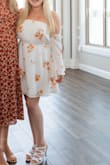 Wore for my bridal shower in Oct! Tight on the arms but stretchy everywhere else - Amanda R.