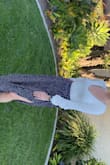 This is such a cute bodysuit I love that you can look so dressy in it. I usually wear large because I like my things to fit loosely, but I went with the medium on this one. I find that it makes the top pretty low cut and I have to pull it up often. But I love it!! - Alexandra H.