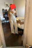 Love this jumpsuit! I'm 5'3 so it's a little long, I have 1.5-inch heels on in the pic and it is still just a little long. Will get it hemmed but it's beautiful other than that. :) - Jaycie B.