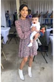 The dress was so cute! I wore it for my baby's baptism. I am currently nursing him and was able to do it discreetly during the ceremony from the left side because it has a hidden zipper. For the rest of the day, I wore biker shorts and would lift them up to feed him. - Vere G.