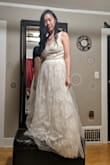 I have a sort of 'rectangular' silhouette, so I was looking for a dress that would flatter that, and unfortunately, this isn't it. But it was a beautiful and very 'bridal' sort of dress, and the tailoring was lovely.
Here I am hunched over and a bit tired after a long day, which I like to think is a good test of a flattering dress. :) - Esther C.