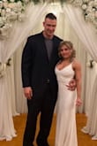 Wanted a simple fitted wedding dress for our elopement. A little long on me. I am a competitive bodybuilder 4'11 106lbs. My husband is 6'6 hence why it may look small. - Montanna R.