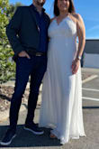 This dress was perfect for our courthouse wedding! It is definitely long. I am 5'11.5" and always have problems with dresses being too short and this dress touches the floor in flats. It's not often I find a dress I can wear with heels! - Meagan M.