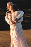This dress was perfect for engagement photos. It was flowy, elegant, and sexy, but covered up my arms which I'm more sensitive about. - Liesel R.