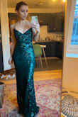 This dress is so pretty and sparkly and perfect! I got an XXS and it's got some stretch and is very flattering. - Kela G.