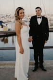 I freaking loved this dress! I wore this as my second dress (reception) for my wedding and it was so comfortable and sexy! I am 5'6'' and wore low heels so I had the dress hemmed a few inches. My wedding pictures didn't do it total justice as it was just so gorgeous in person. Perfect for a beach wedding! - Zorana N.