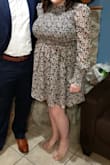 I wear a 36DDDD and have a hard time finding a dress that fits. This was was perfect. It was very roomy/stretchy at the top. I could have done with a size large but it was out of stock. I am considering purchasing the other color. I have gotten so many compliments and it works for different occasions. Best Lulus purchase. The shoes are also from Lulus. - Catherine F.