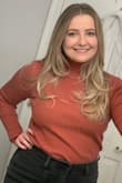 I was worried that this too would be too fitted, but I think it fits great! Right now I'm between a medium and large, depending on the style and I got a medium. I love the ribbed material and its very comfortable. I wore it with a black jean skirt to go out to dinner, but its a nice turtleneck that I could also wear to work! - Amber F.