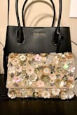 The detail of this clutch is EVERYTHING!!! The material is soft, the chain has a pretty good weight to it. I plan to use it in the spring! - Sierra C.