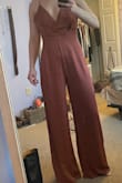 I absolutely loved this! it looked amazing, my photo doesn't do it justice. BUT I have a small chest, that would have been fine with the right adjustments, but it is very long. Even with 4 inch heels I would have to have it altered. It was for a farm wedding and I just cant see myself making it through more than 2 hours in 4 inch heels.  But is looks so good, and feels good. I returned it, but I might actually repurchase it. - Amy B.