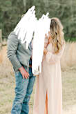I wore this for engagement pictures and it was perfect. I ordered a size Large and it was too big in the waist, but fit perfectly up top. I pinned the waist with safety pins, and it was PERFECT! Couldn't see the pins either. My bust area was covered well. 
The medium was too tight in the shoulders and didn't cover the bust area. Overall if you have a bigger bust, definitely order your normal size and just pin the waist a bit! The second picture shows it pinned back from the front! - Brooke K.