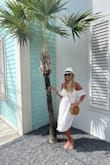 I really loved this dress, the midi length and the lining all made me feel so comfortable, covered and cute. It fit my 34ddd chest too !! Great vacation outfit, just adorable and a great price. Buy it - Shelly G.