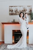 Bought this dress in a size Large and although it was snug in the waist (I have bigger hips than normal after having my son) it fit like a glove.
Wore this for my small wedding and had everyone thinking this dress cost more than what it actually was. Quality is amazing!! Highly recommend getting this dress. - Victoria F.