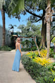 It fits a bit big on me, but overall love the dress. The colour is beautiful and love the open slits on the legs and the open back ! Great vacation dress. - Tessa L.