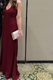 The quality of this dress was great and the material was thick.  Loved the adjustable straps as well.  This dress is perfect for tall girls as I was able to wear 2in heels and still have my dress touch the ground - Jenna N.