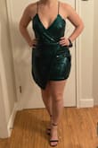This dress is so so cute and fits me really well. The photos are from when I tried it on right when I got it so I didn't adjust the straps or anything. The only downside is that it is a little shorter than what I would normally like in the back - my butt is covered enough but there isn't a lot of wiggle room. I do have a larger butt and wide hips so maybe if you are a little smaller in the booty region it wouldn't be as short. I am planning on wearing it on a night with lots of dancing so I need to figure out if it passes the dancing test! In short, it is so cute and flattering but beware the back might be a little short! - Taylor B.