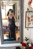 This dress is so cute it fits perfect in all the right places. The sequence is almost like a rose gold color when the light hits it but still super cute! - Lena W.