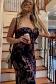 Now, I'm not a fan of velvet. I hate it. But this dress is so beautiful in person, the weight of the material is super flattering and the color is deep and just beautiful the way the light catches the flowers on the navy velvet. - Rebecca A.