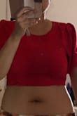The top is labeled as a crop top but I thought it would fit a tiny bit longer. Still cute and perfect if you're looking for a true crop top. - Mo M.