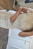 Fits great except the zipper bunches up in the back but it could be because I'm short. Just doesn't lay flat on my back but not super noticeable. Still a super cute dress that'll I'll wear at my bridal shower. - Davina G.