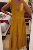 Love this bright color--as pictured! Slit is just right, doesn't go too high even though I'm tall. Wearing it for my rehearsal dinner I love it so much! I usually get a small and a small fits great. True to size or maybe slightly big, definitely no need to size up. - Hilarie J.
