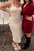 Loved the dress, just wish there was a bit more support in the breast region. It was a perfect dress for my bridal shower; got so many compliments! - Carmela V.