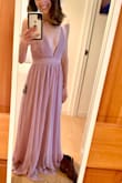 Gorgeous dress! The material itself is beautiful and high quality! I love the dusty lilac color and elegant texture of the material. I also like that the straps are adjustable and that I don't need to wear a bra with this dress because the fabric has ruching! The dress itself is too long on me (I'm short so I figured that would happen), however, that's an easy fix at the tailor's! The top part of the dress fits great and I'm very happy with my XS purchase. :) - Megan W.