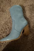 The shoes fit great! I was expecting a very bright blue color and it wasn't at all. A little darker than shown in the picture. - Casey A.