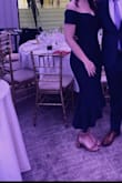 Beautiful dress. I'm pear shaped so I ordered a medium for my hips and it was a tad big in the chest but probably couldn't go down to a S. Material is great with a nice stretch - Courtney M.