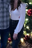 I love this bodysuit it is super flattering and fits pretty much perfectly sometimes I do have to pull it up but other than that it is a great top. - Kaitlin E.