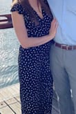 I love this jumpsuit- I did size up to a medium because I was afraid the small would be too tight but I think the small would have fit fine. It has a tie though so even though it is slightly big the tie makes it fit perfect! I am pretty tall and the legs were kind of long but with some kind of heel it is fine. - Kaitlin E.