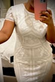 I was looking for a dress for my civil ceremony and I ordered this dress as one option. Well, this is the winner! The fabric is truly beautiful, delicately made. Looks very elegant. It runs a bit small because I am usually a L and had to order an XL for this dress. 100% recommended! - Laura B.