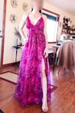 Love it. The color is a cooler pink than pictured on the Lulus model, but still stunning and bright. The fabric is very lightweight, non-itchy, and shimmers in the light. Can wear without a bra, feels completely secure in the bust if you tighten the straps. The length is perfect when worn with heels (I'm 5.5). Overall, the quality is amazing for the price. I feel like a princess. :) - Darcy G.