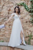 I chose this for my wedding gown. It is beautiful and well-made, it looks so much more expensive than the price tag. I originally ordered a small, but ended up having to exchange for an extra small to make the cups of the bust fit just right. It was also just a tiny bit too sheer for me, so in addition to having the hem taken up, I also had my seamstress put in an extra skirt lining. I wanted a dress that would be comfortable, that I didn't have to pull or tug at all night to keep in place. Something I could wear for both an outdoor summer wedding, and honeymoon beach photos. This checked all of the boxes.  I wore it it grass, sand, and submerged in the ocean, and the dress still looks great! - Sonja K.