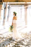 No one can believe I only spent $100 on this dress, and that I got it online. The fit is so flattering, and the material is great quality. It was perfect for my intimate backyard Hawaiian wedding. I ordered a medium, and had it taken in just a touch because I lost some weight. Other than that, I would say that sizing runs a SMIDGE large. Overall, I could go on and on about this dress. - Brooke N.