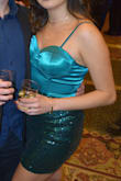 This is a gorgeous dress that I wore to a Vegas-themed grad school event, and for that it was perfect! It is very short but it's what I was looking for. It did fit me perfectly. My complaint is that the bottom of the skirt does not stretch, meaning I couldn't walk too comfortably, and using a public restroom (where you can't really sit down) was really hard. I also heard the seam "breaking" several times which damages the sequins. - Clara L.