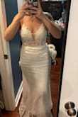 I absolutely fell in love with this dress the moment I put it on. Fits like a glove and is true to size. Unfortunately, I returned because I'm eloping on the beach and it just wasn't the right vibe I was looking for but this was THE dress if I was doing my wedding any different. - Ashley W.