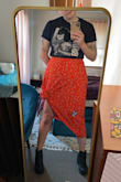 This skirt is one of the most worn pieces in my wardrobe. I can wear it with a tank or off-shoulder top & a necklace if I want it to be cute for date night -- I also wear it with band tees if I want it to be casual. Typically I tie it in a knot just above my knee because the length is a bit odd on my legs, but I think it looks great that way. - Katie K.