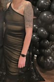 This dress is gorgeous! It fits like a glove and the ruching helps hide any areas you're insecure with. I'm 6'1 and the dress comes down to my knees. The only complaint I have is that the way the zipper is sewn into the stretchy fabrics has it puckering very easily. Overall a gorgeous and versatile dress! - Anna R.
