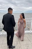 As a petite individual, I didn't have to get the dress hemmed and it looks like a dress of high quality. It is so versatile and can be worn in different ways. The taupe color is what it looks like in pictures. A little boob tape and nipple covers did the trick! - Ashley S.