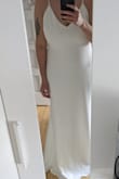 I ordered this dress for my wedding and I was not disappointed! It's of great quality and the sizing was great! I'm usually a large but ordered an XL as I wanted to be able to get it altered to my shape closer to the wedding. The material is not super see-through but I'll have still have to be mindful of my undergarments in this dress!
It's long enough! I'm 5'9" almost 5'10" and it's perfect! - Carlie K.