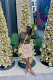 I wore this in winter in Atl to a museum. I felt very comfortable and stylish. The lining made it very soft and the zipper was durable. It class at a great length to still be active. Wish they had in other colors. - Makeda W.