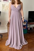This dress has 3 layers and feels so high quality! The fabric is very flowy and makes me feel so dainty and elegant as I walk! I do wish the straps were a bit thicker but it looks secure enough lol. I definitely would need fabric tape to keep the girls in check. Overall I'm very happy with the purchase! - Diana L.