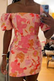 This dress fits perfectly and looks exactly like in the photos. The only personal drawback is the fabric wraps around the tips of the sleeve and is itchy (I'm really sensitive to that) when not worn off-shoulder, but I kept the dress anyway cause it's really pretty and flattering. It's hard to find dresses with such a great cut. The light in my photos throws off the dress colors a bit I think. - Zephani D.