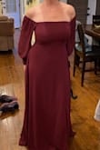 My chest was held up without a bra, which was a huge plus. Looks better in the photo, only because the model has a small chest. Larger chests take up most of the top area. The color is beautiful and fits very well.  Don't mind the way I'm standing. lol. Choosing a different dress. - Jacquie R.