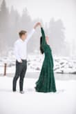 I wore this dress for our engagement pictures. It was such a great, flowy dress! As others have mentioned, the bust area is fairly revealing and might need some pinning. I was able to get away with just tying it tightly and did not use alterations. Otherwise, the length is great for tall gals! - Laura H.