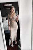 This is such a cute dress, I found it really long on me. I got an XS and am 5' 2" - the bottom went to my ankle area. But that's an easy fix. Other than that, I find the fit very form-fitting. I'm on the petite side, especially in the bust area but have bigger hips. So this dress has more of a sexy fit than I anticipated. I am excited to wear it on beach vacations! - Alexa W.