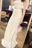 I was worried it wasn't going to fit good because I am such a petite woman but it fits perfectly! I'm not wearing my 4" heels in the picture but when I have them on the dress is at the perfect length. The material is such beautiful quality given the price! It is a little more beige than what the picture shows but works for me! I can't wait to wear it for my wedding! - Rebecca D.