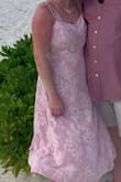 Wore this as a guest to a destination wedding. Love the color and fabric. The dress is comfortable. I was a little worried about the stitching around the chest that my boobs would look weird, but it ended up looking really nice on me. The straps are actual strings you have to tie so you will need help from a friend. :) - Samantha D.