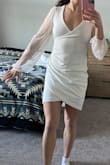 Fits well and is flattering! Good material, fun sleeves, length is short but not too short (and I have long legs). Recommend:) - Jill D.